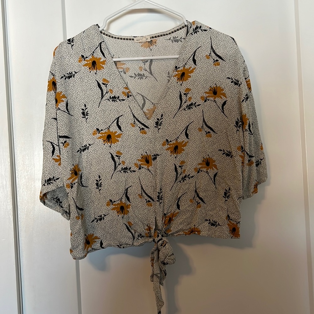 Really cute floral blouse with ties in the front